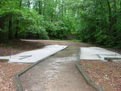 the horseshoe courts and volleyball court